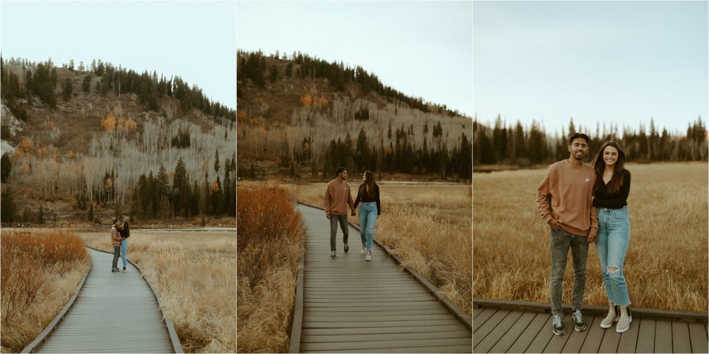 couple walking along boardwalk