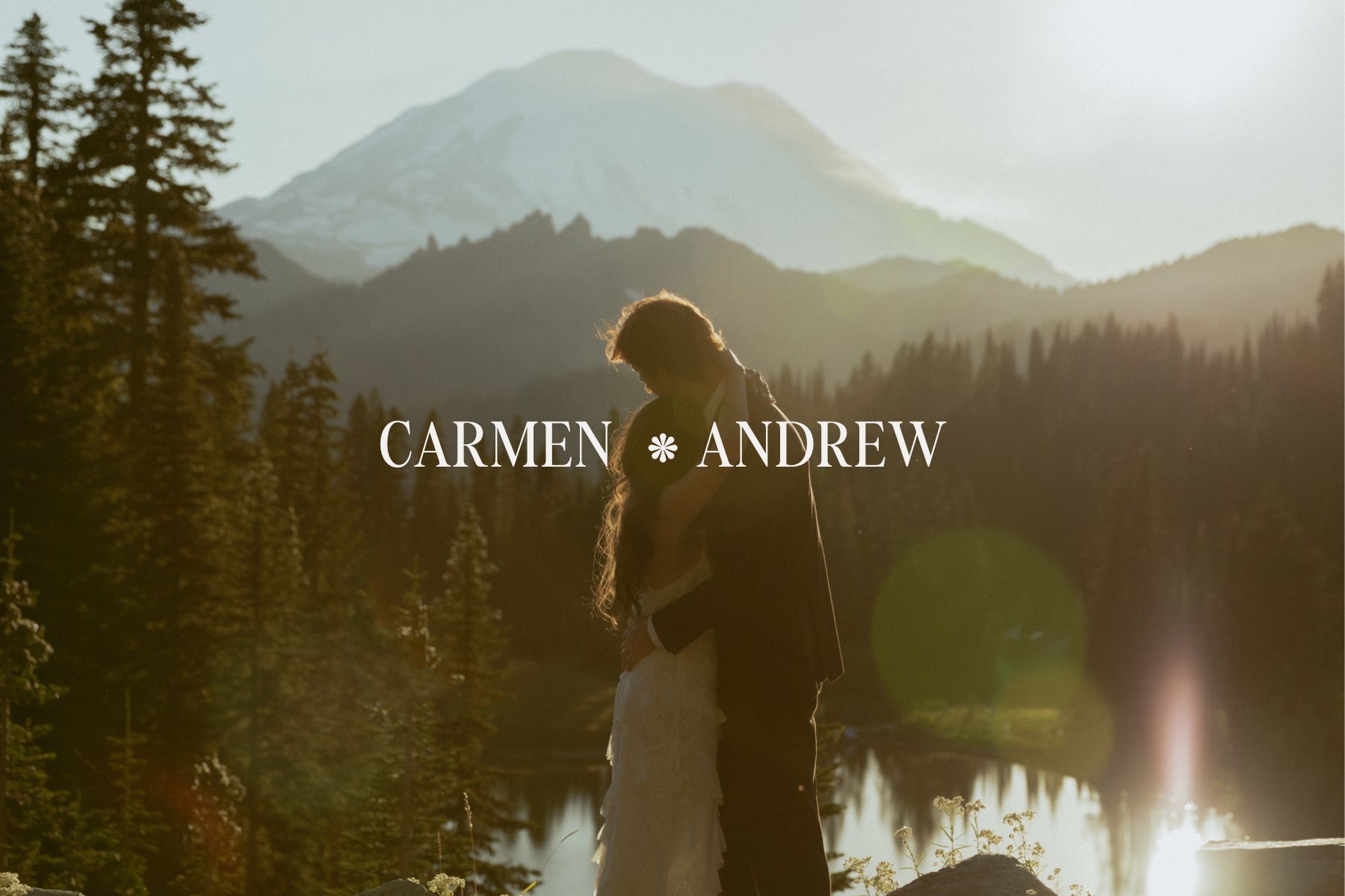 Mt. Rainier elopement couple hugging at golden hour above an alpine lake with Mount Rainier glowing behind them.